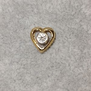 1/8 Diamond Bezel Set in 14kt gold pendant
